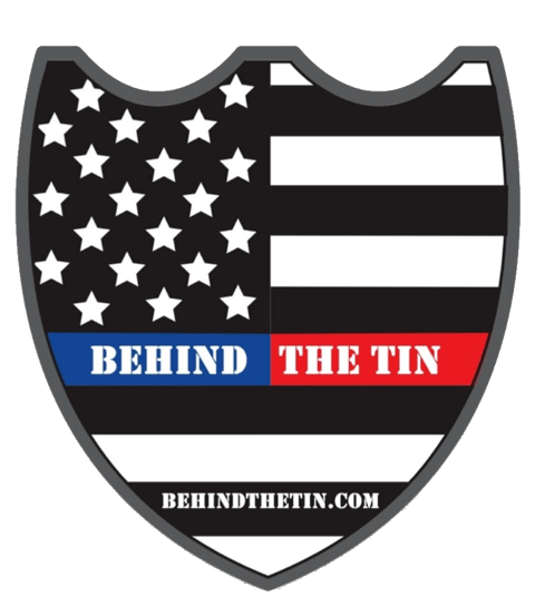 Behind the Tin Logo